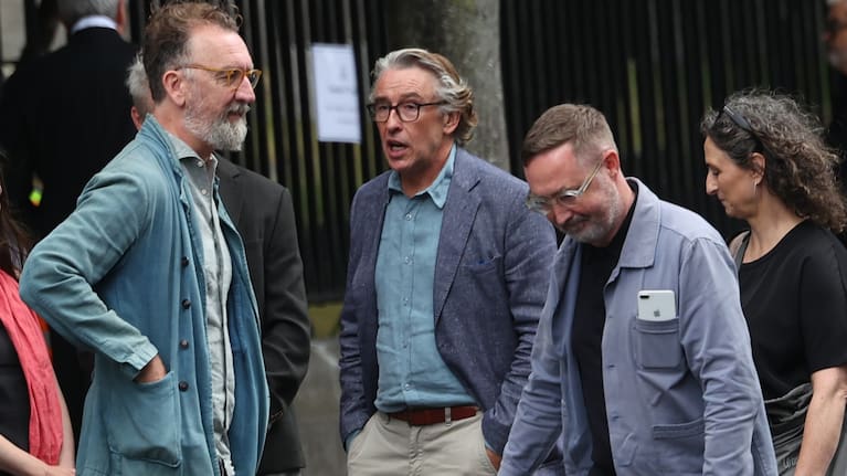 Steve Coogan and Chris O'Dowd arrive for the funeral of Glen Hansard at St Patrick's Cathedral in Dublin.
