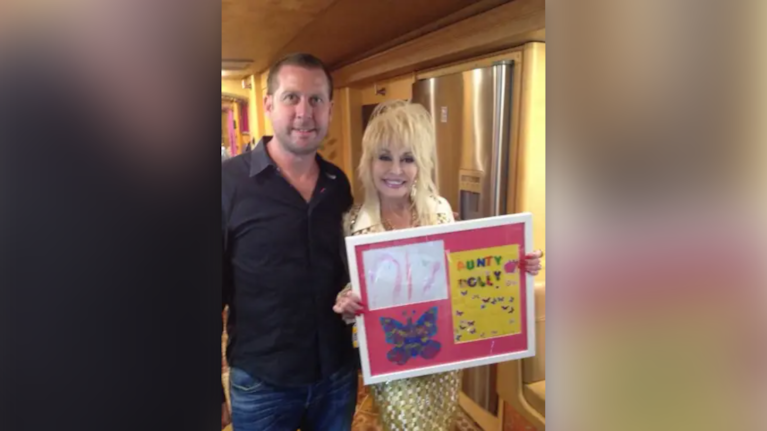 Steve Guest and country music star, Dolly Parton