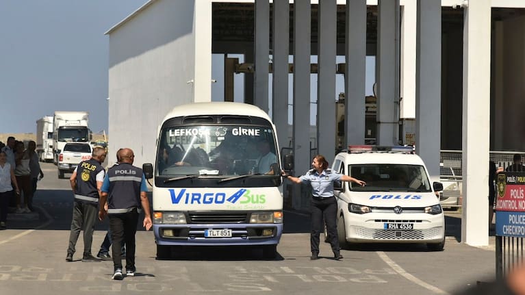 Survivors of a catamaran-style ferry which was capsized off the coast of northern Cyprus arrive at the port of Kyrenia.