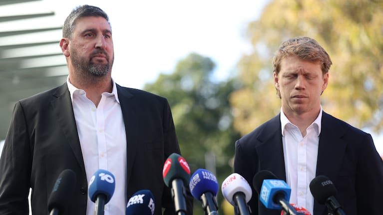 Syndey Swans coach Dean Cox and captain Callum Mills address the media following the suspension of five players.