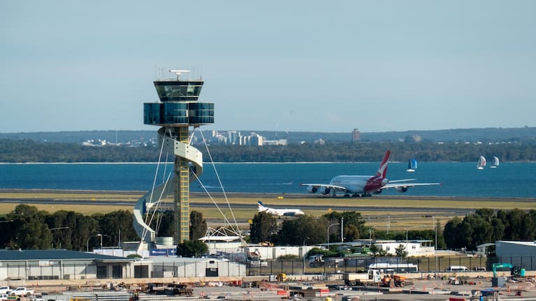The air traffic control tower rises above Sydney Kingsford-Smith Airport (file image).