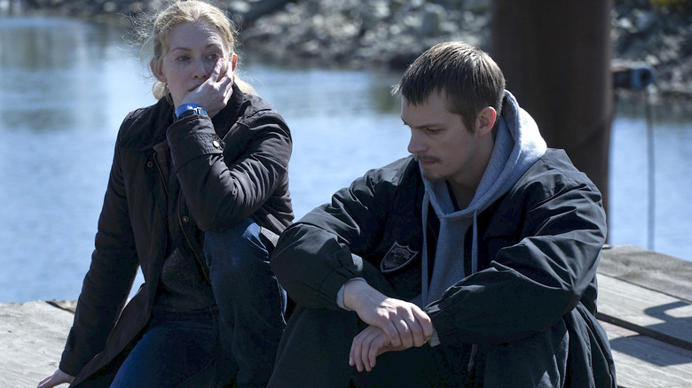 Sarah Linden and Stephen Holder on a dock in 