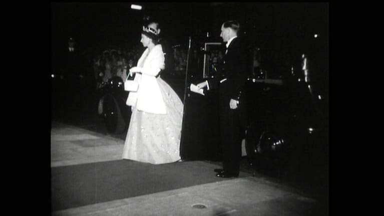 The newly crowned Queen Elizabeth II gets out of her car at the St James Theatre.