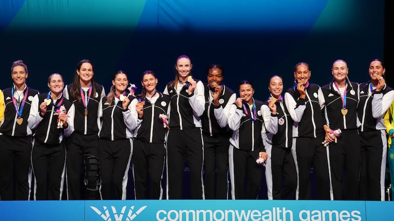 The Silver Ferns stand for the medal ceremony after securing their first Commonwealth Games gold since 2010.
