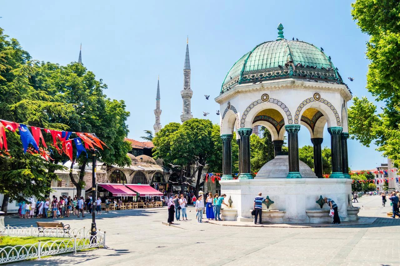 Visitors gather around the historic ablution fountain in the courtyard of the Sultan Ahmed Mosque, also known as the Blue Mosque, in Istanbul, Türkiye. (Adobe Stock Photo)