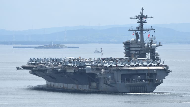 Aviles' son, Joshua Aviles said he has been working 12-hour work shifts for more than 250 days without a break on the USS Lincoln.
