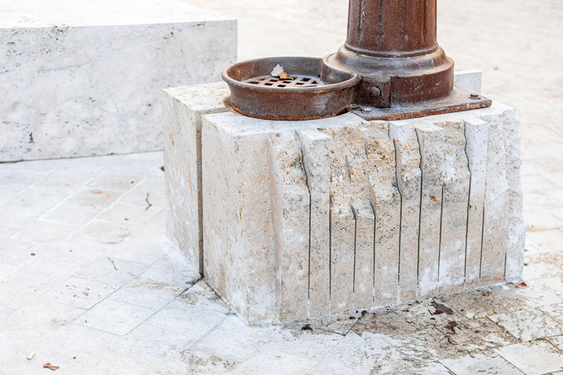 carved travertine transforms paving, furniture, and planting across spanish historic old town - 5