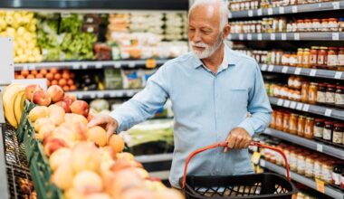 A person shopping for fruit in a grocery store.