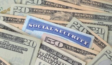 A Social Security card in a pile of cash.