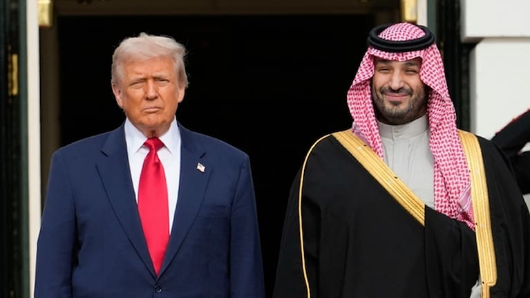 US President Donald Trump stands with Saudi Arabia's Crown Prince Mohammed bin Salman on his visit to the White House, November 18, 2025, in Washington.