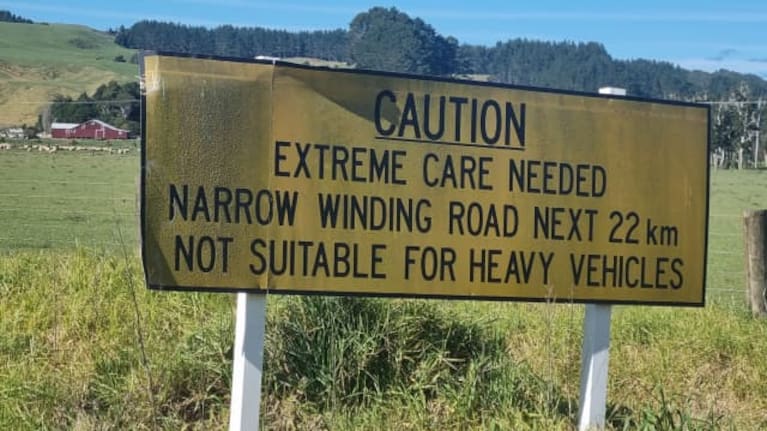 Warning sign at the beginning of the road.