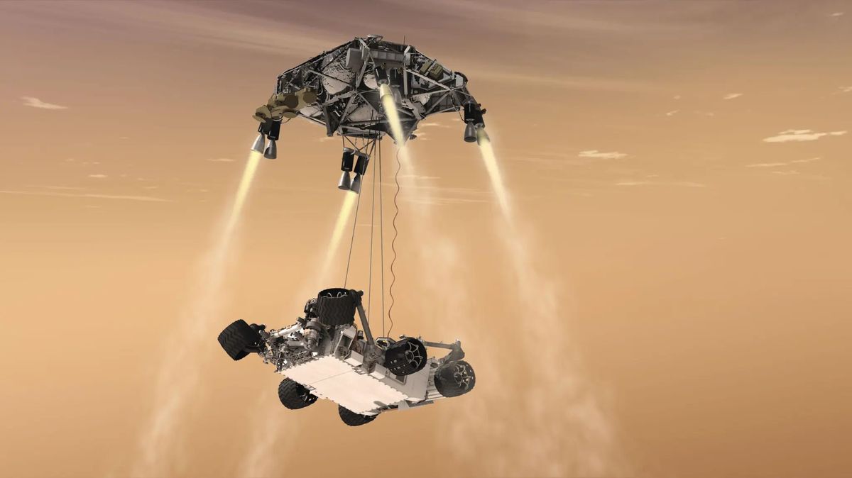 artist's impression of curiosity rover landing on the Mars surface.