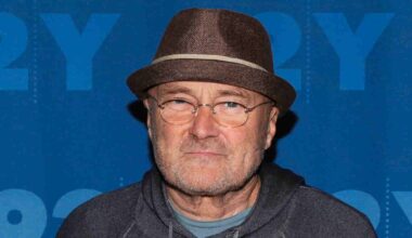 Phil Collins posing for a photograph in 2016