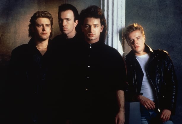 Adam Clayton (far left), The Edge (second from left), Bono (second from right) and Larry Mullen, Jr. (far right) form the rock band U2.