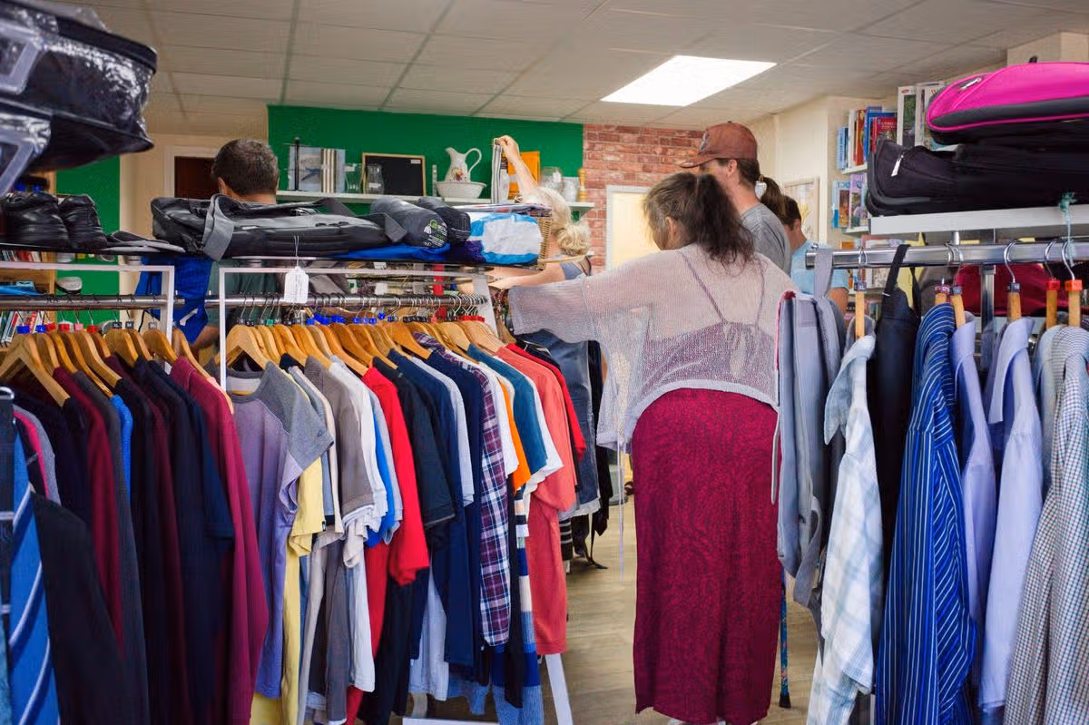 People shopping in a charity shop