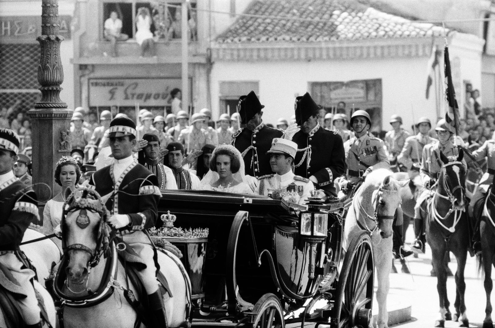 Image may contain Jim Lowe Irving Berlin Carriage Transportation Vehicle Adult Person Wedding Machine and Wheel