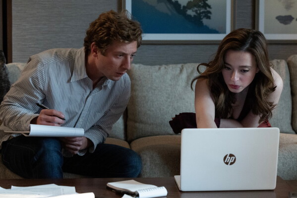 This image released by Sony Pictures shows Jeremy Allen White, left, and Mikey Madison in a scene from “The Social Reckoning.” (Leah Gallo/Sony Pictures via AP)