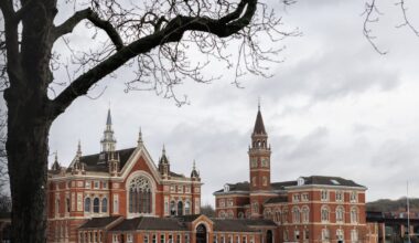 Dulwich College London historic main building with lush green grounds, highlighting prestigious private school setting