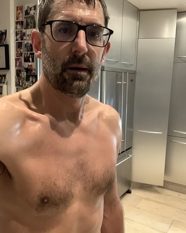 Louis Theroux, 56, has revealed he's been doing Joe Wicks' exercise plan daily but says he loves boozing and used to enjoy 'a nightly spliff' (pictured in 2021 after one of Joe's workouts)