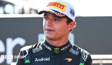 Lando Norris walking off the podium following the Spanish Grand Prix