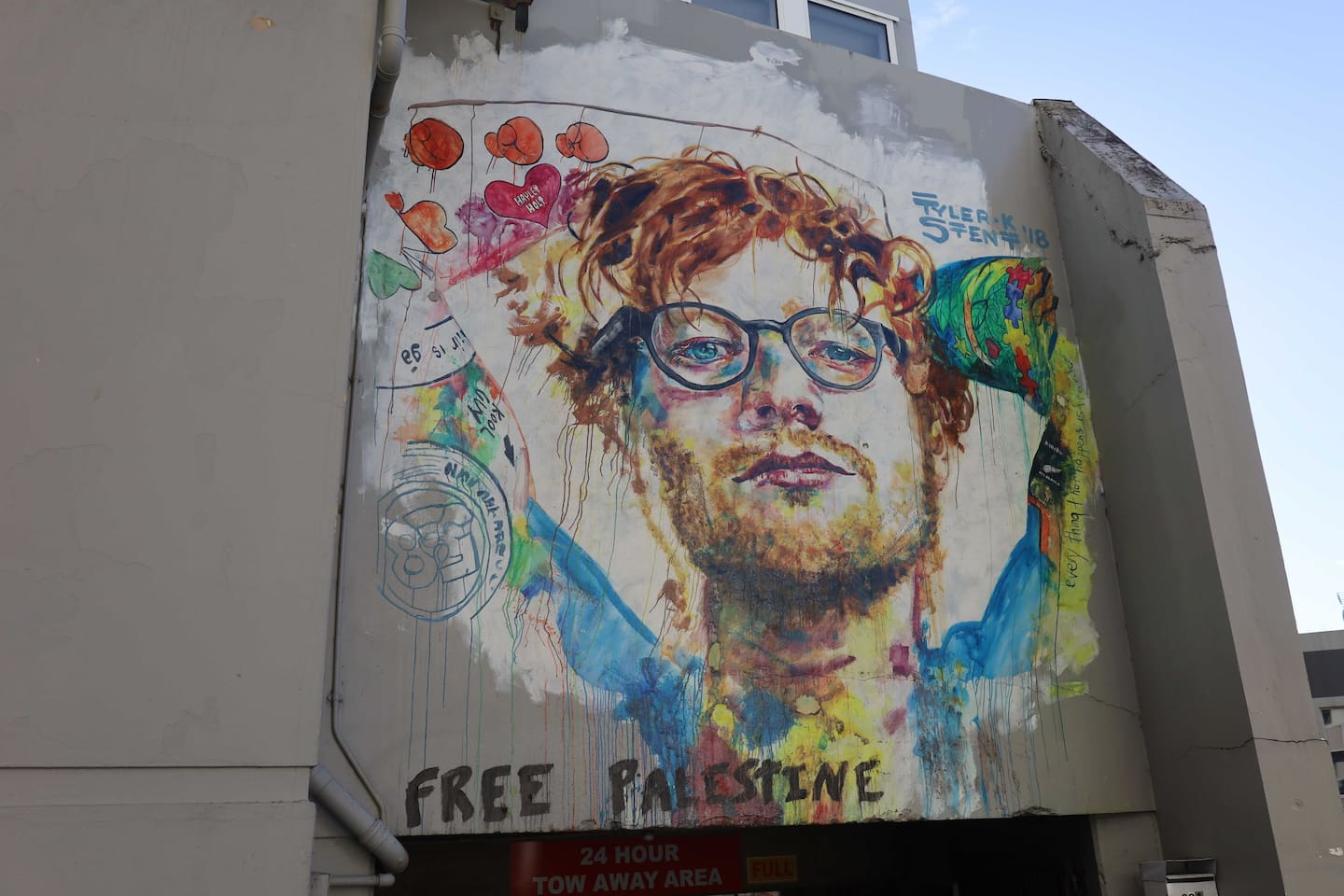 The words “FREE PALESTINE” were painted across the bottom of Dunedin’s Ed Sheeran mural in Bath St, while red paint was splashed across the portrait and left dripping down his face and neck. Photo / Ben Tomsett