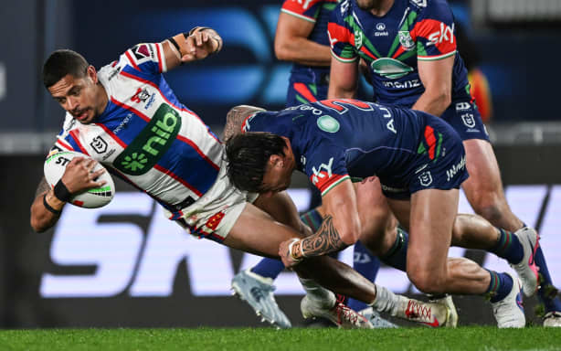 Dane Gagai of the Knights tackled by Charnze Nicoll-Klokstad of the Warriors, NZ Warriors v Newcastle Knights, Week 2 Final of the NRL Telstra Premiership at Eden Park, Auckland, New Zealand on Saturday 20 September 2026.
© Photo: Andrew Cornaga / Photosport