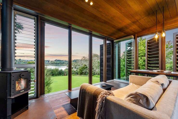 A property on Bishop Lane, near Matakana, with two luxury cabins and plans for a substantial home sold in July for $8.45 million. Photo / Supplied