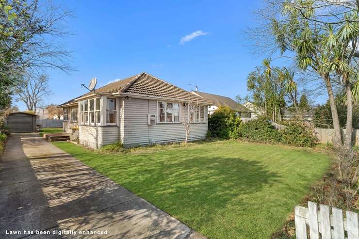 A rare 1628sqm property spead over two titles on Grimseys Road, in Redwood, sold for <img,373,500 after two bidders went head-to-head for it. Photo / Supplied