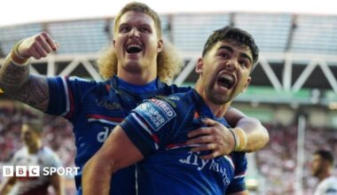Jack Sinfield celebrates his try for Wakefield