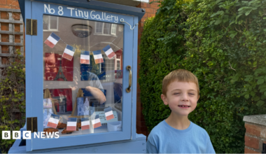 Max standing next to the Tiny Gallery outside his home in Melton Mowbray, Leicestershire.