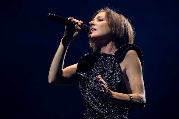 Tina Arena performs on Sunday night. The concert brought together around 120 performers, including Farnham’s band and backing singers.