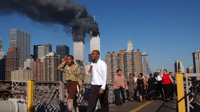 Shocked New Yorkers crossing the Brooklyn Bridge on the morning of 9/11.