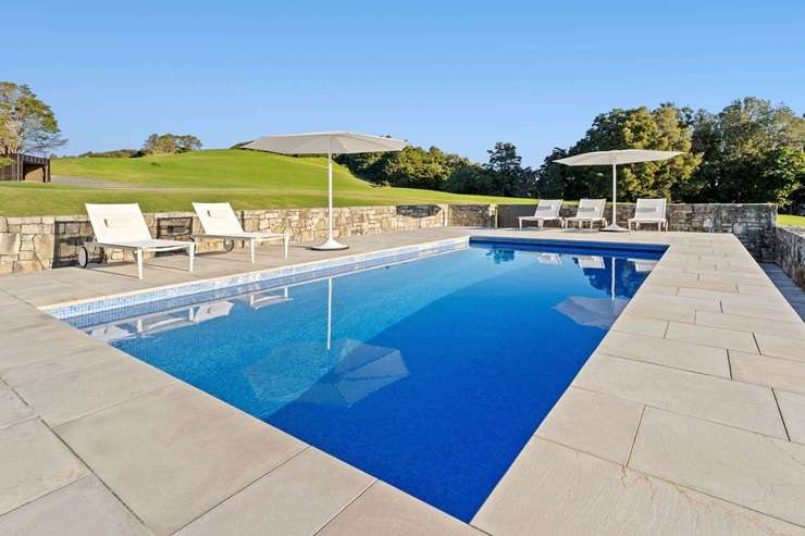 A property on Bishop Lane, near Matakana, with two luxury cabins and plans for a substantial home sold in July for $8.45 million. Photo / Supplied