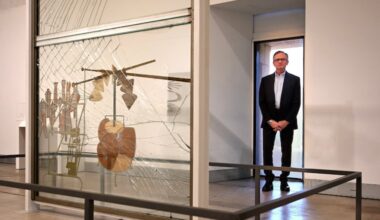 Daniel H. Weiss, director and CEO of the Philadelphia Art Museum, is photographed Jan. 7. In front is the piece, “The Bride Stripped Bare by Her Bachelors, Even” (1915–1923, also called The Large Glass) by the French American avant-garde artist Marcel Duchamp.
