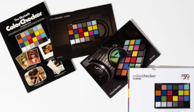 Four X-Rite ColorChecker Classic packaging boxes are arranged on a white surface.