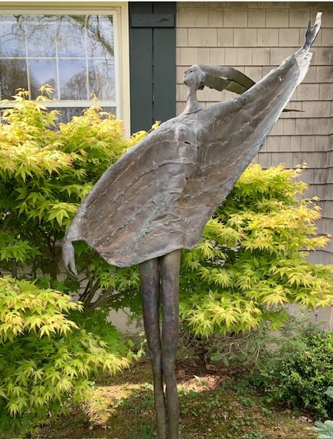 “Dancer” by the late Easton artist Lubomir Tomaszewski, is sited by a Japanese Maple - Contributed photo