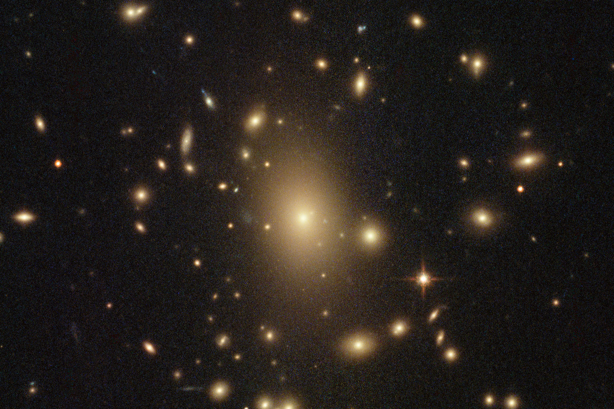 Galaxy cluster RXC J2211.7-0350 and gravitational lensing. Credit: ESA/Hubble & NASA, RELICS