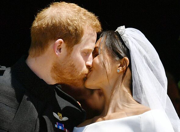 Harry and Meghan on their wedding day Harry and Meghan on their wedding day