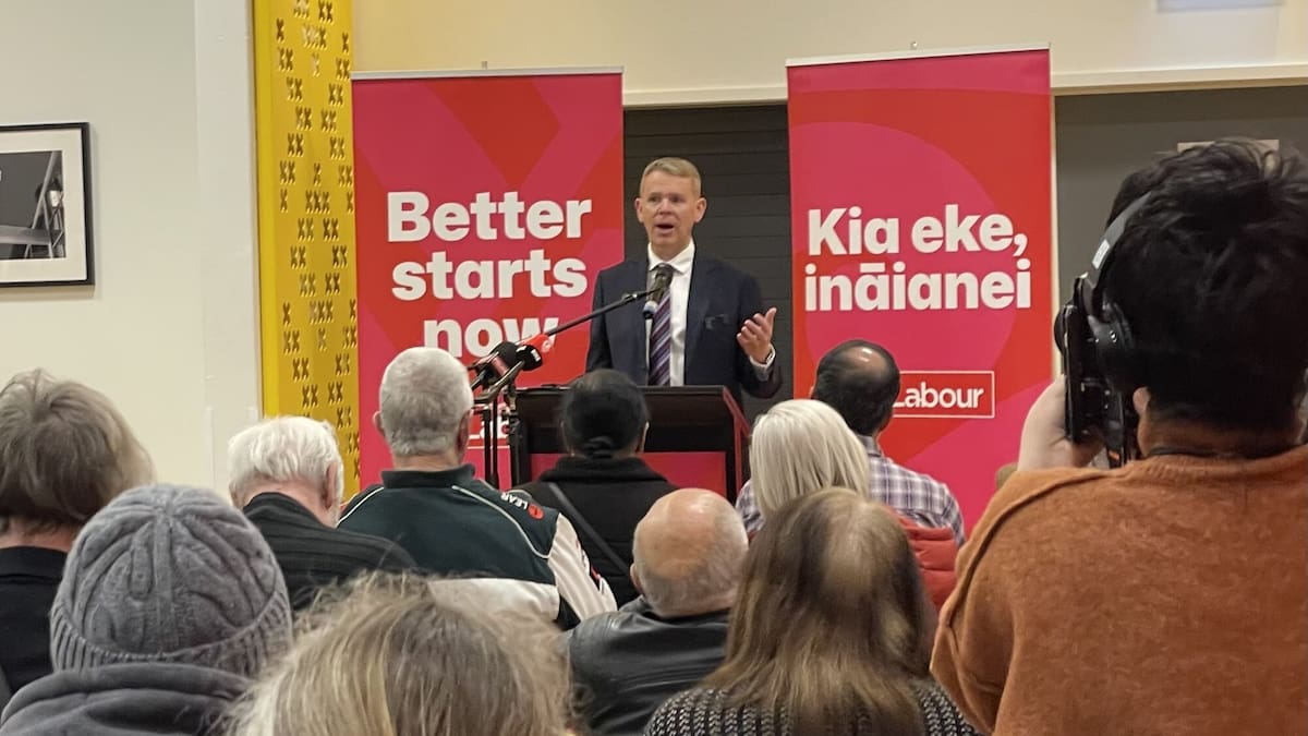 Chris Hipkins holds first public meeting of campaign, meeting supporters and a cat