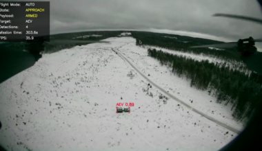 Still image from a video showing the demonstration of Scaleout Systems' AI-enabled target recognition and engagement capability for an autonomous attack drone under the ALMA project led by BAE Systems Bofors. The image shows the quadcopter drone's perspective as it approaches a target identified as an armored engineering vehicle using the words "AEV" with a target identification probability of 89 percent.