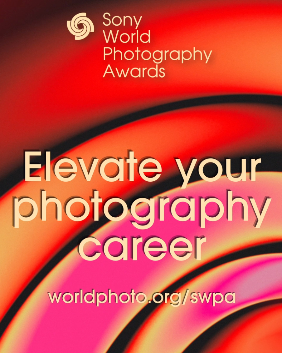 Abstract red and pink swirls form the background for the Sony World Photography Awards text: "Elevate your photography career" with website link