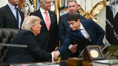 US President Donald Trump shakes hands with Richard Ascroft, CEO North America of Sun Pharma, during an announcement on Healthcare Affordability in the Oval Office of the White House in Washington, DC on August 31, 2026. (AFP)