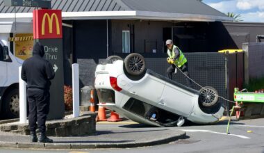Car on its roof at Kelston McDonald’s drive-thru, police say parking mishap