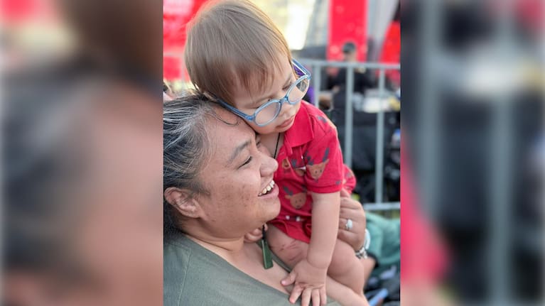 Alex with son Phoenix.