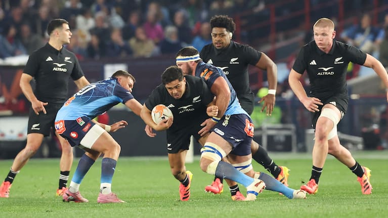 Anton Lienert-Brown is brought down by the Bulls defence.