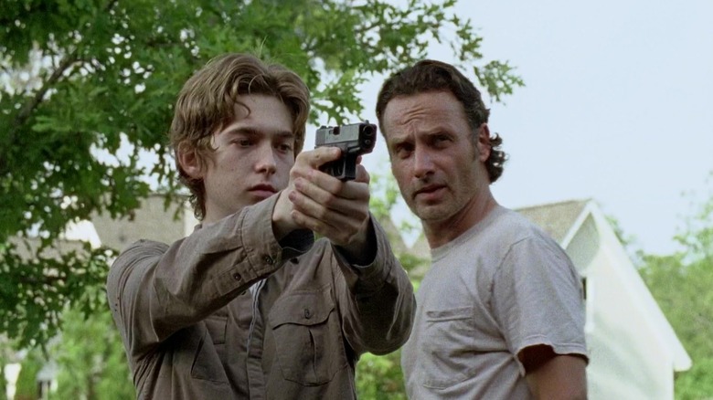 Rick teaches Ron how to shoot in 