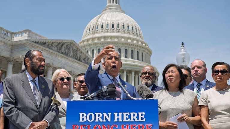 Congressional Hispanic Caucus Chairman Adriano Espaillat, D-N.Y., center, and other Democratic House members react to the Supreme Court's decision to uphold birthright citizenship at the Capitol in Washington