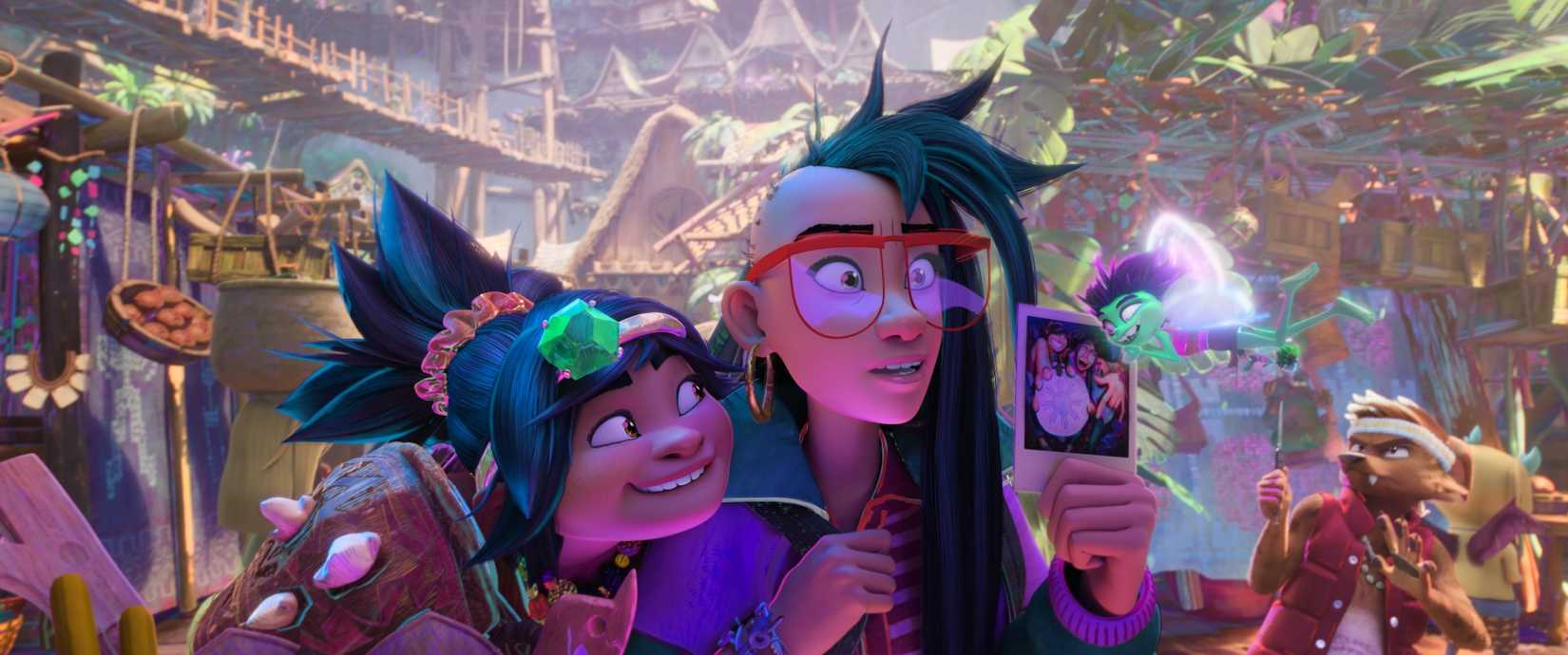 Jo and Raissa, two Filipino teenagers with spiky black hair, stand in a crowded marketplace in the animated movie Forgotten Island