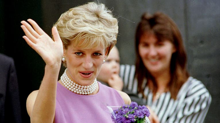 Diana, Princess of Wales waves to the crowd as she leaves the Victor Chang Cardiac Research Institute in Sydney Australia.