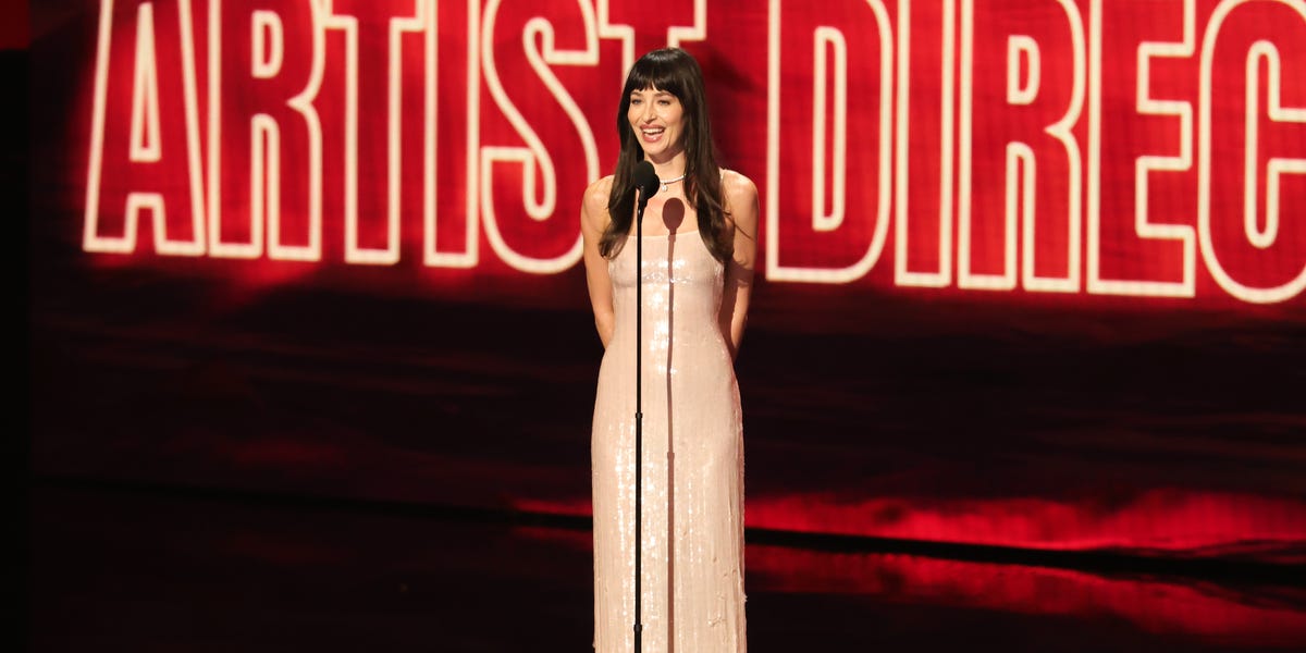 Dakota Johnson Wears a Liquid White Gown to the VMAs